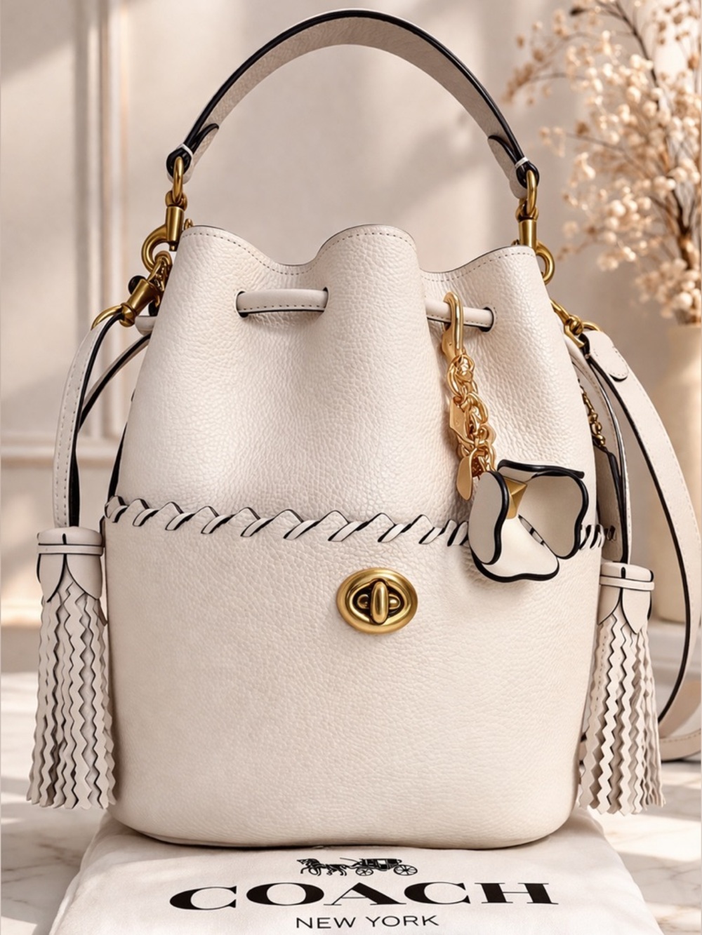 Coach Lora Bucket Bag With Whipstitch Detail Ivory Leather + Tea Rose Charm